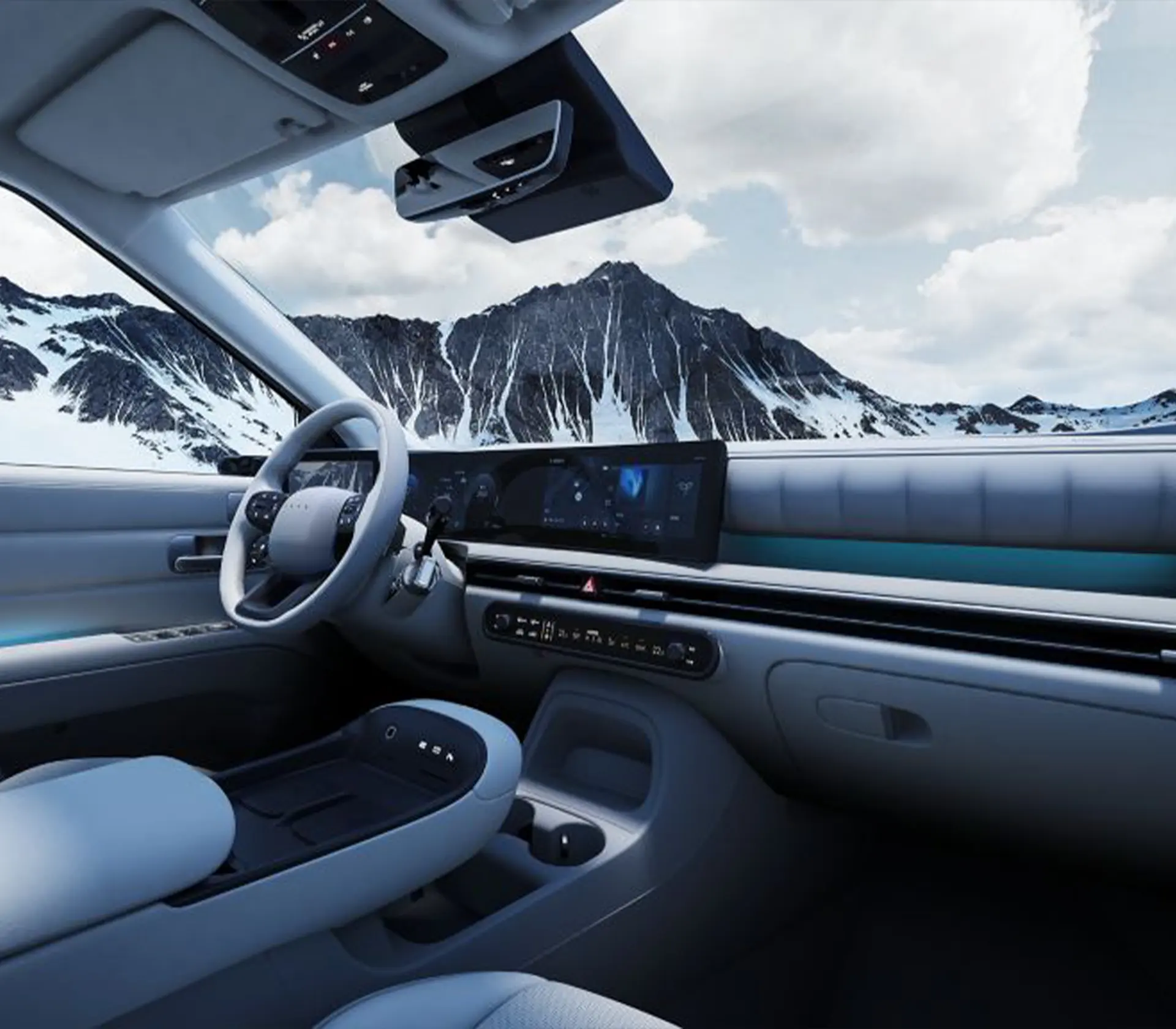 das Interieur des Nexo in weiß in einer Schneelandschaft mit verschneiten Bergen im Hintergrund im Winter