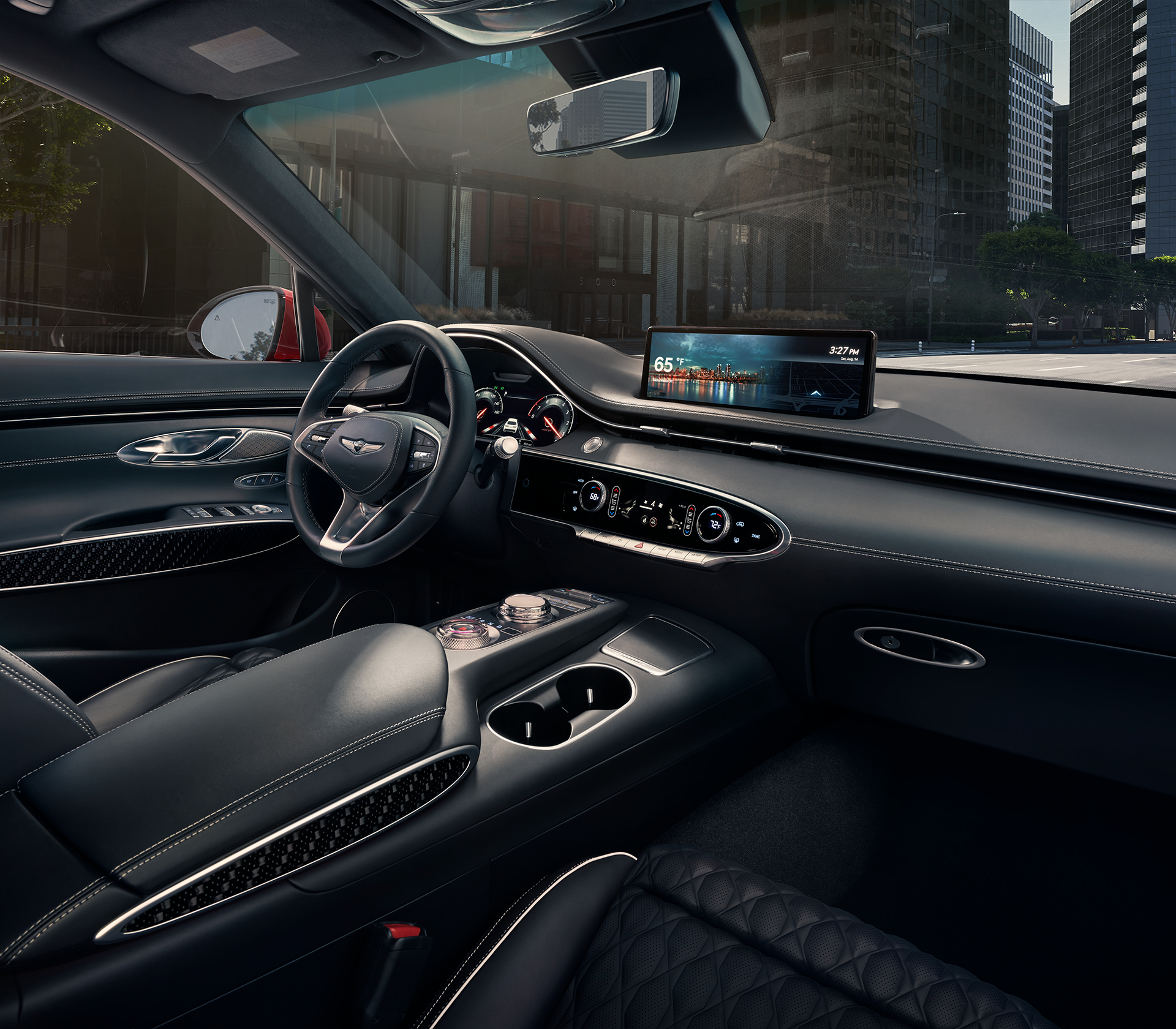 Genesis GV 70 Innenansciht Lenkrad und Sitze schräg in schwarz