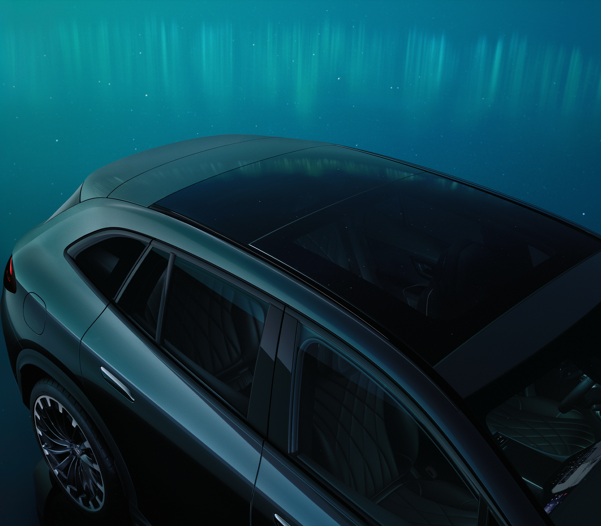 Mercedes-Benz EQE SUV von Oben in einer Umgebung mit Polarlichtern 